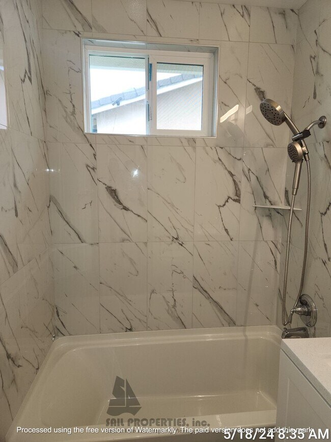 Building Photo - Welcome to this stunning 4-bedroom, 3-bath...