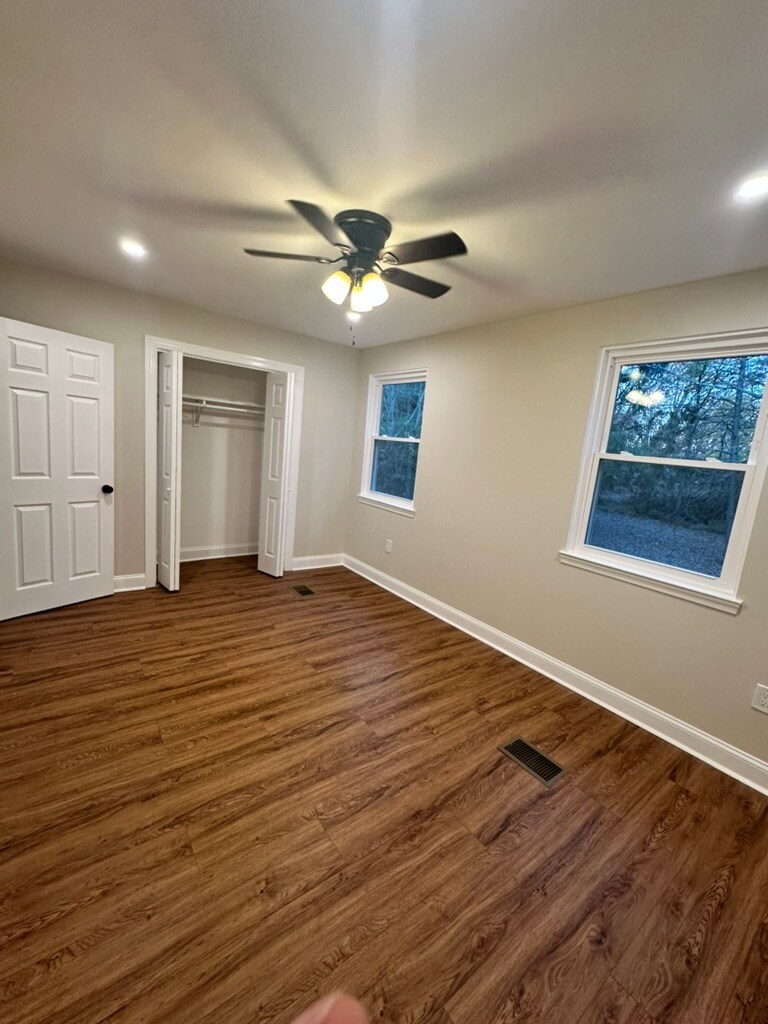 Oversized sunlit bedroom with expansive walk-in closets—designed for comfort, natural light, - 55 Providence Ave