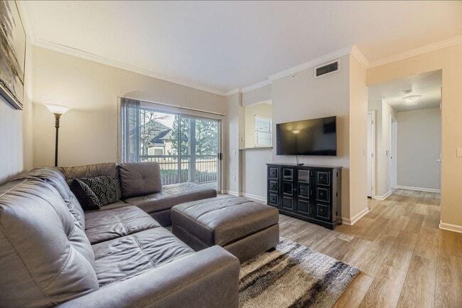 Building Photo - Charming 1 bed/1 bath Condo with Garage- Gated Community with Pool and Fitness Center