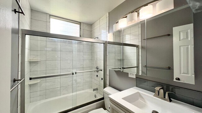 Building Photo - AVAILABLE NOW! Spacious 3-Bedroom, 2-Bath Corner-end Split-level Unit in Kaneohe with 1 Assigned ...