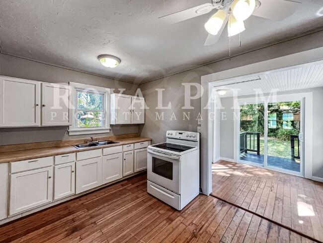 Building Photo - Deck the halls or the French doors, because this charming century-old single family home is avail...