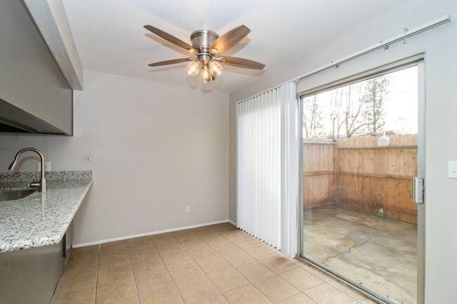 Kitchen nook and enclosed/gated patio - 4721 N Cedar Ave