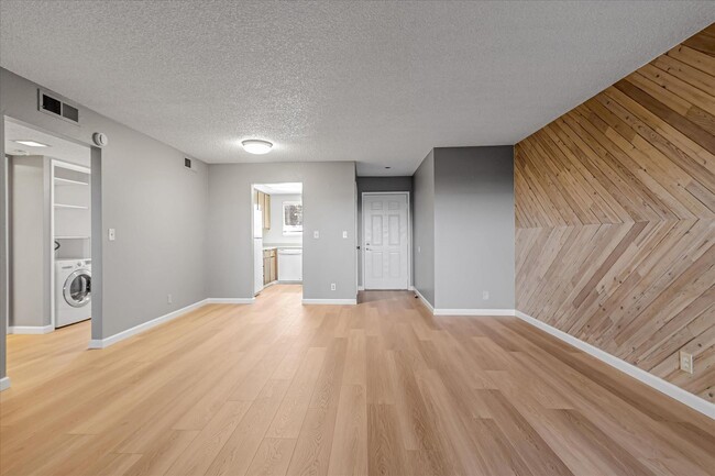 Building Photo - Stylish End-Unit Condo l Private Patio l C...