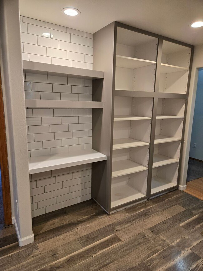 Building Photo - Large lot with tons of storage !  3 br , 2 bth + office+ 2  Car-garage + 2 Wooden Sheds