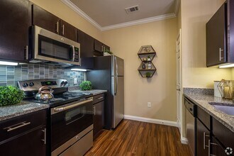 Building Photo - Escape the Norm with Modern Comfort!