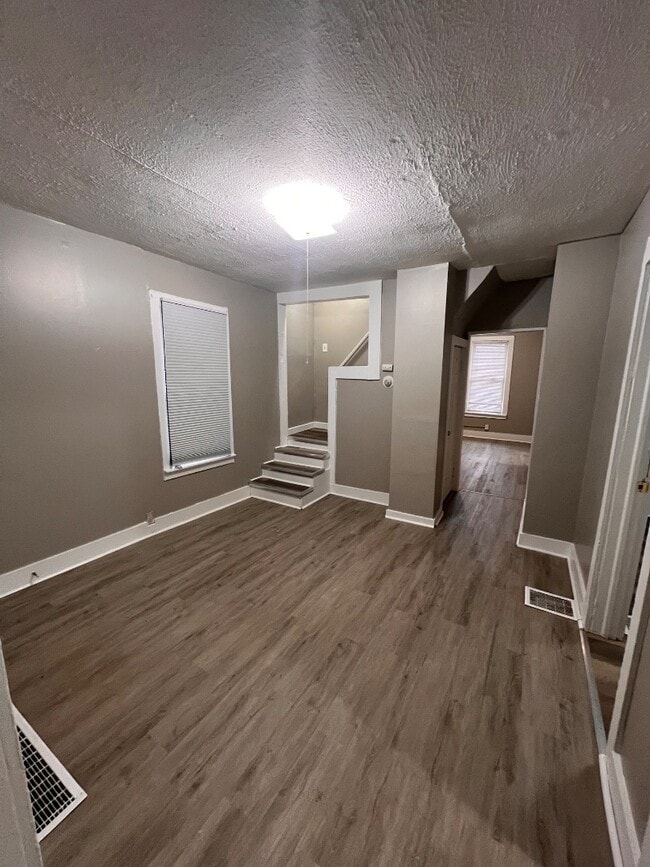 Building Photo - Fully Renovated 5-Bedroom, 2-Bath Single-Family — Driveway + Water, Sewer & Trash Covered