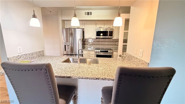 Building Photo - 6650 W Warm Springs Rd