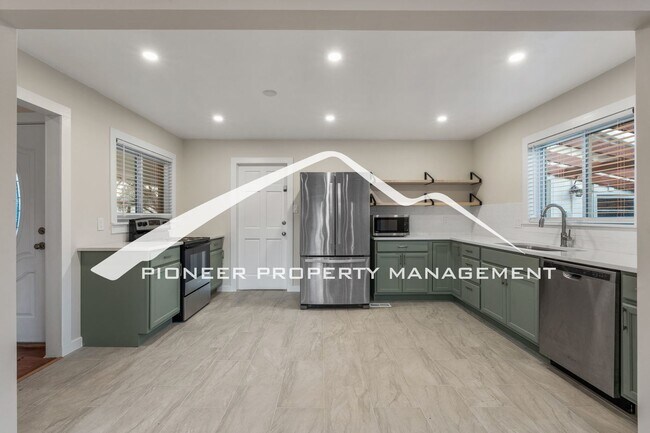 Building Photo - Beautifully Renovated Ranch Home with 2 Car Garage, AC, Garden Space & Prime Location