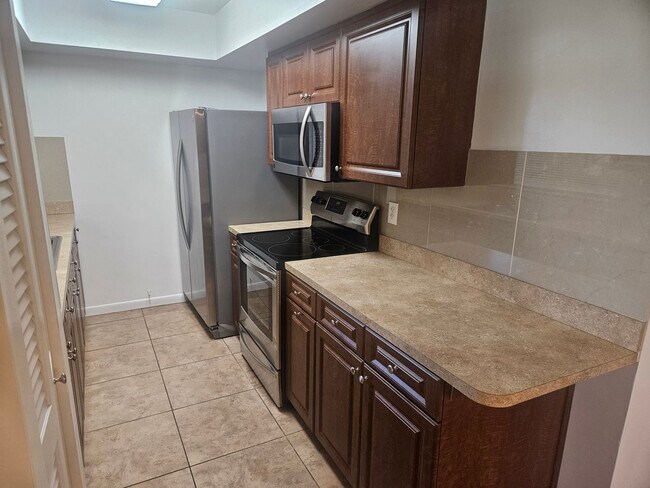 Building Photo - Charming 1-Bedroom 1-Bath Condo in 55+ Com...