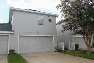 Building Photo - MOVE IN NOW-Water & electricity included 1x1 above garage apartment!! Full kitchen & bathroom!! W...