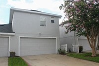 Building Photo - MOVE IN NOW-Water & electricity included 1x1 above garage apartment!! Full kitchen & bathroom!! W...