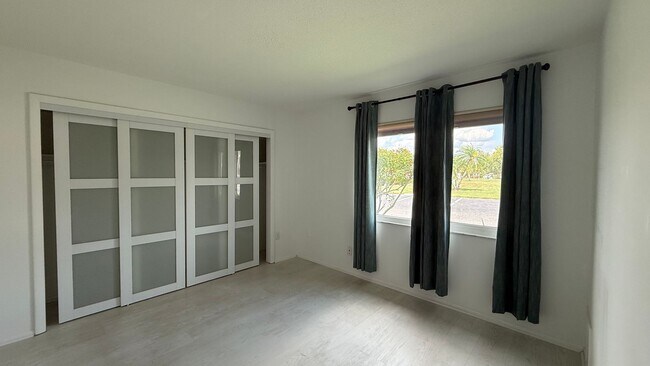 Building Photo - All inclusive 2BR/ 2B Condo in 55+ Community