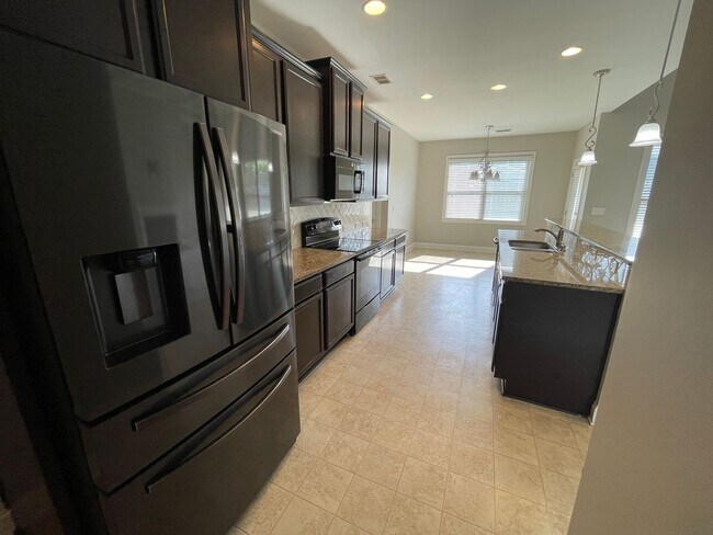 Building Photo - Fabulous 1 level home coming soon in July!!