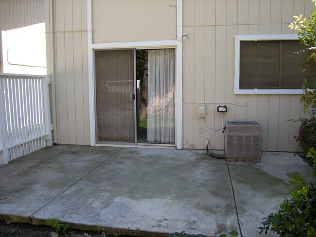 Building Photo - Condo unit featuring updated kitchen with ...