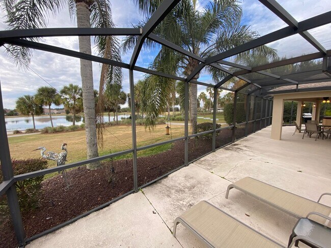 Building Photo - SEASONAL RENTAL. Large 4 Bed + 4 1/2 Baths Home, w/Views of the Jacaranda Golf Course and Lake in...
