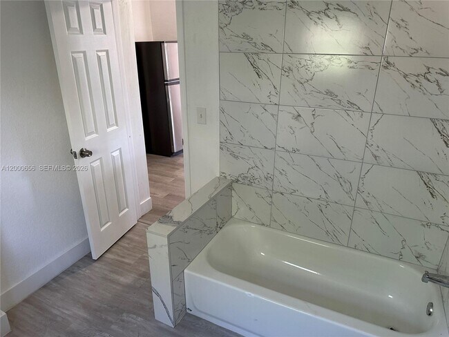 Building Photo - 5646 NW 3rd Ave