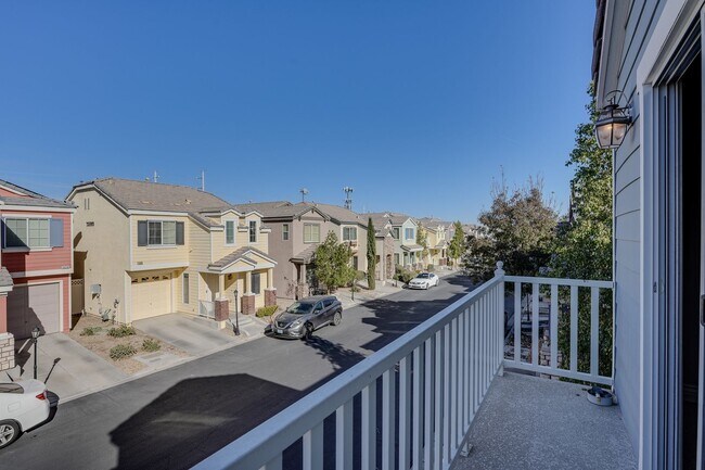 Building Photo - Gated Townhome with Strip Views from the Balcony!