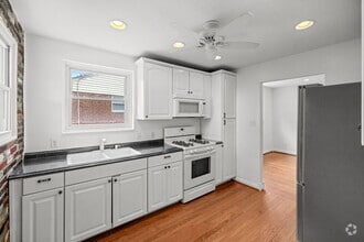 Building Photo - Rare Garage and Steps to Metro 4br  2ba