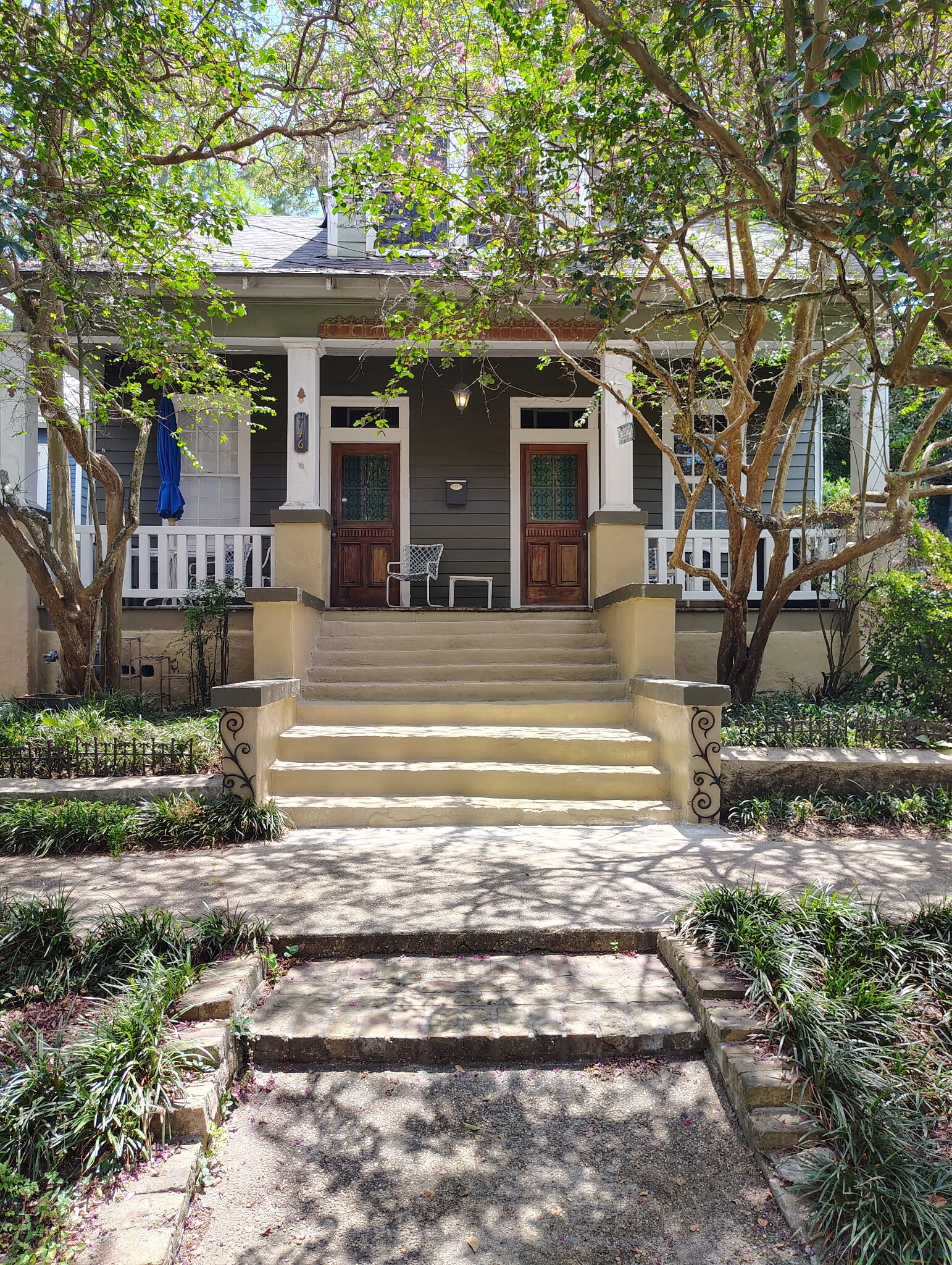 Freshly painted porch and steps to relax after a long day! - 746 Europe St