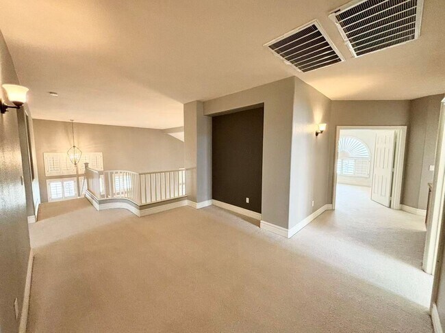 Building Photo - Rhodes Ranch-5 brs 4 bathrooms 3-cars gara...