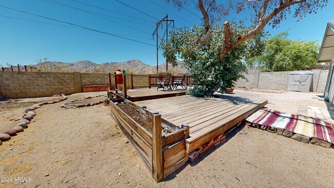 Building Photo - 11020 S Mandan St