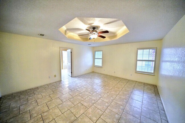Building Photo - Executive Home in Greenshire with Luxurious Updates and Spacious Outdoor Living - Agent Commissio...