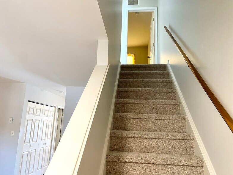 Stairway to 2 bedrooms and 1 full bath - 24 Sandstone Ct