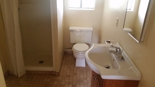 Building Photo - Great home with 2 car garage, deck and she...