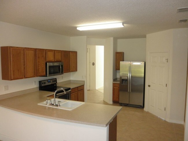 Building Photo - STUNNING HOME IN BELLA VISTA AT TIVOLI WOODS