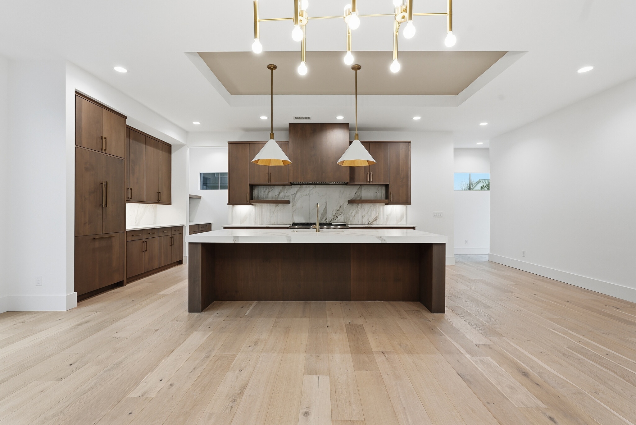 Expansive open concept living space with floor to ceiling windows and seamless flow into the kitchen - 3718 West End Ave