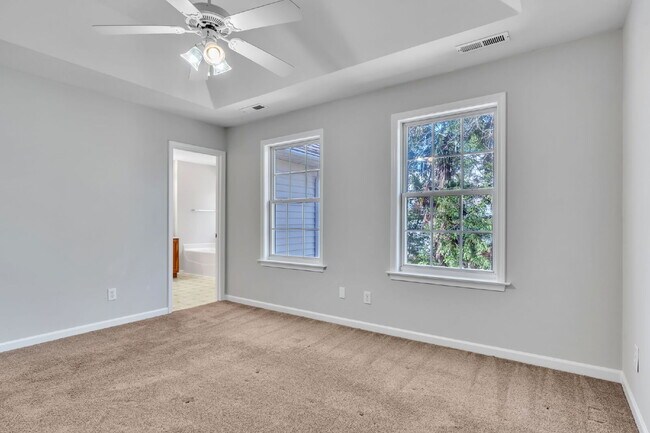 Building Photo - Beautifully Appointed 4BR Home Featuring a Screened Porch, Spacious Living Areas & Community Pool...