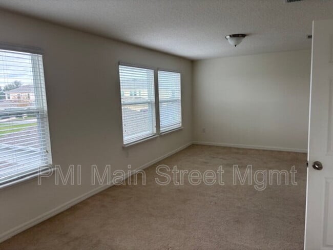 Building Photo - 8130 Red Stopper Ln