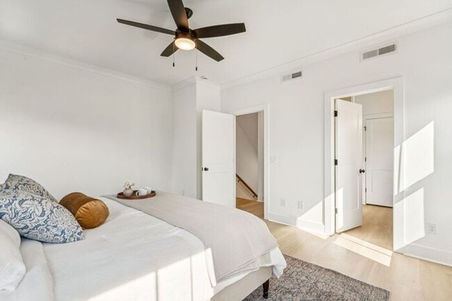 Building Photo - High-End 2BR Townhome | Rooftop Terrace + 2-Car Garage | 24-Unit Community