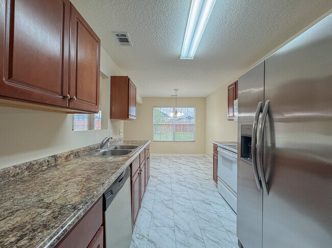 Building Photo - 5021 Scotch Pine Ave