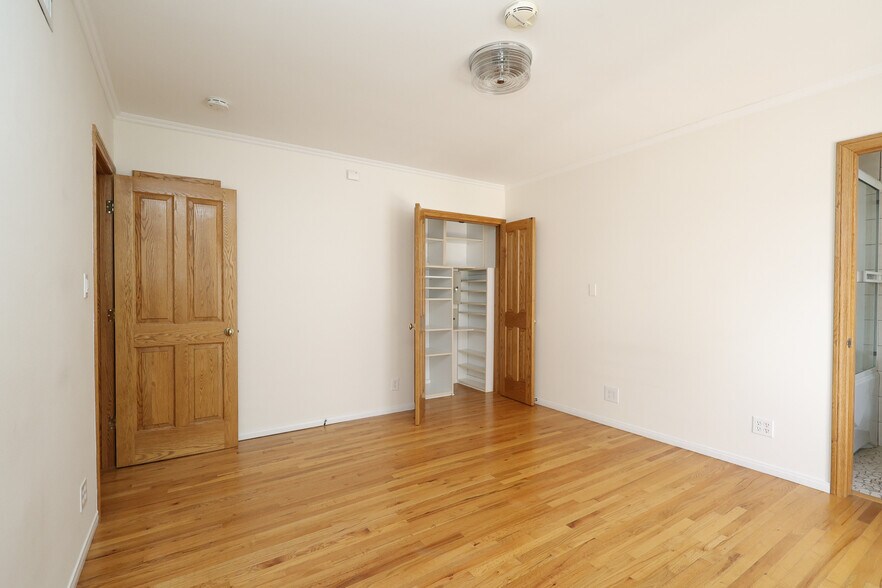 Master bedroom view of closet and door entrance - 4831 Canoga Ave