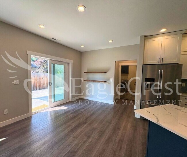 Building Photo - Contemporary Home With A Covered Patio & Quartz Countertops