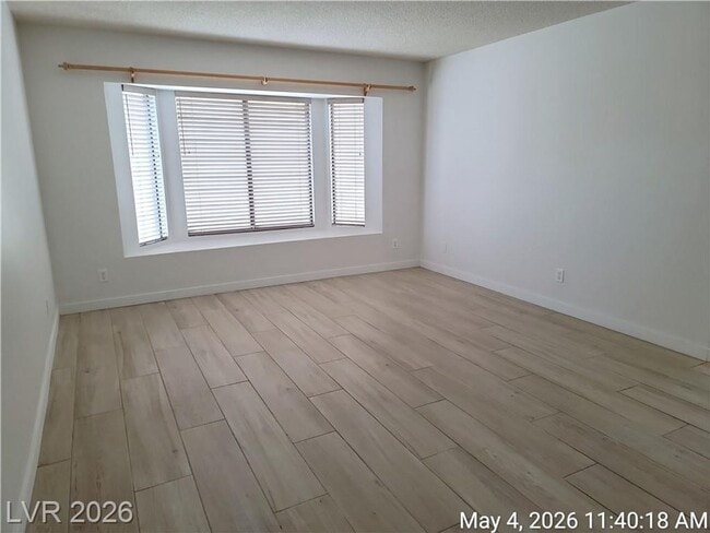 Building Photo - The Lakes Home with No Carpet, Fireplace & Covered Patio