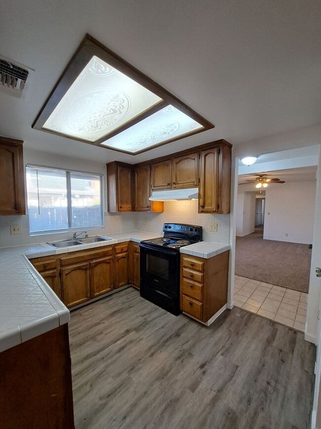 Building Photo - RENT REDUCE & MOVE IN SPECIAL: HALF OFF THE 1ST MONTH'S RENT - Spacious 3-Bedroom Home Steps from...
