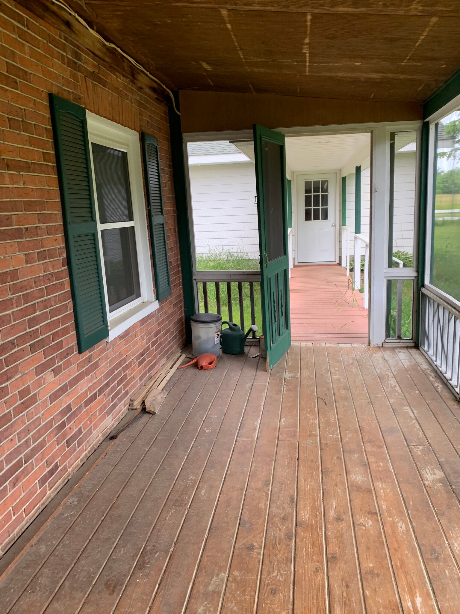 Screened porch with covered walkway to two car garage - 56 Finney Rd