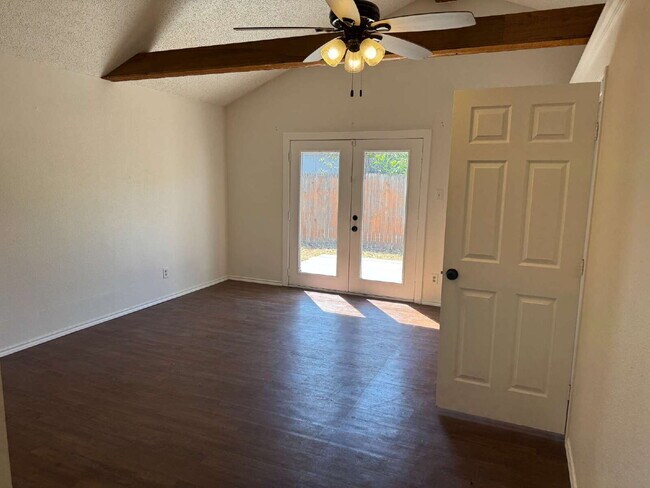 Building Photo - "Charming 4-Bed Lubbock Retreat: Granite Kitchen, Hardwood Elegance & Cozy Fireplace!"