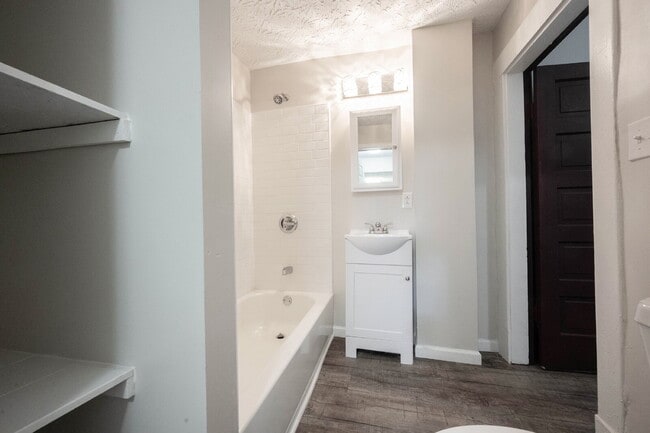Building Photo - "Spacious 4-Bedroom Gem with 2 Full Baths ...