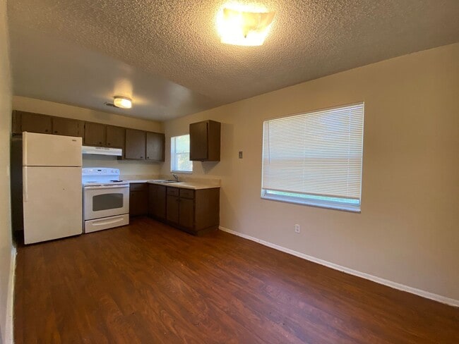 Building Photo - Corner Lot  Home with Oversized, Fenced Back Yard