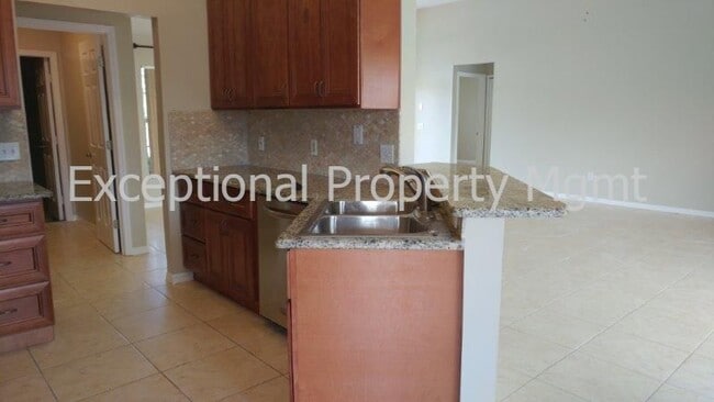 Building Photo - 3 Bed 2 Bath SW CAPE Home! With Lawn Service Included!