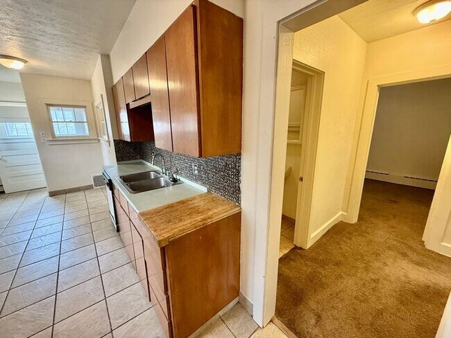 Building Photo - 1/2 Off First Months Rent! 3 Bed + 2 bonus rooms in basement, 2 Bath Home NEAR CSU! Flexible leas...