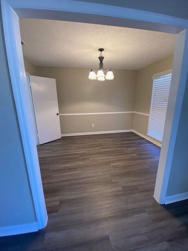 Building Photo - A Quiet Location, $200 Move-N-Special