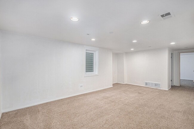 Building Photo - Updated Five-Bedroom Brick Ranch in the He...