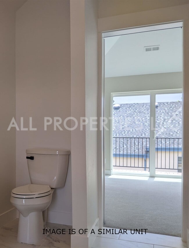 Building Photo - 8059 W 52nd Dr