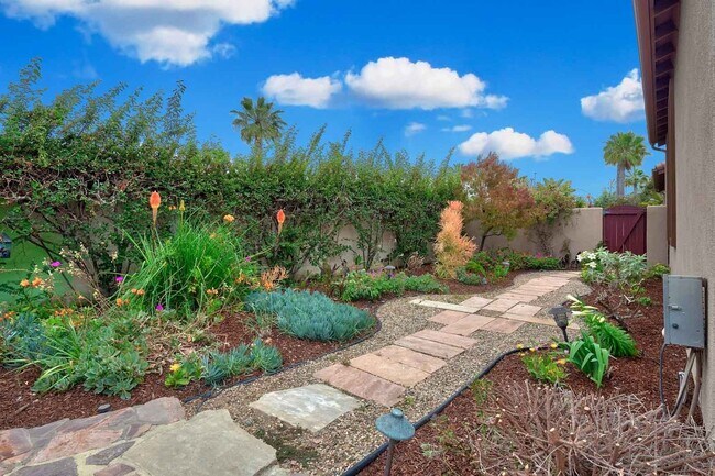 Building Photo - Gated corner lot home walking distance to the beach