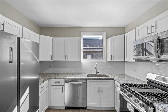 Building Photo - 7815 S Langley Ave