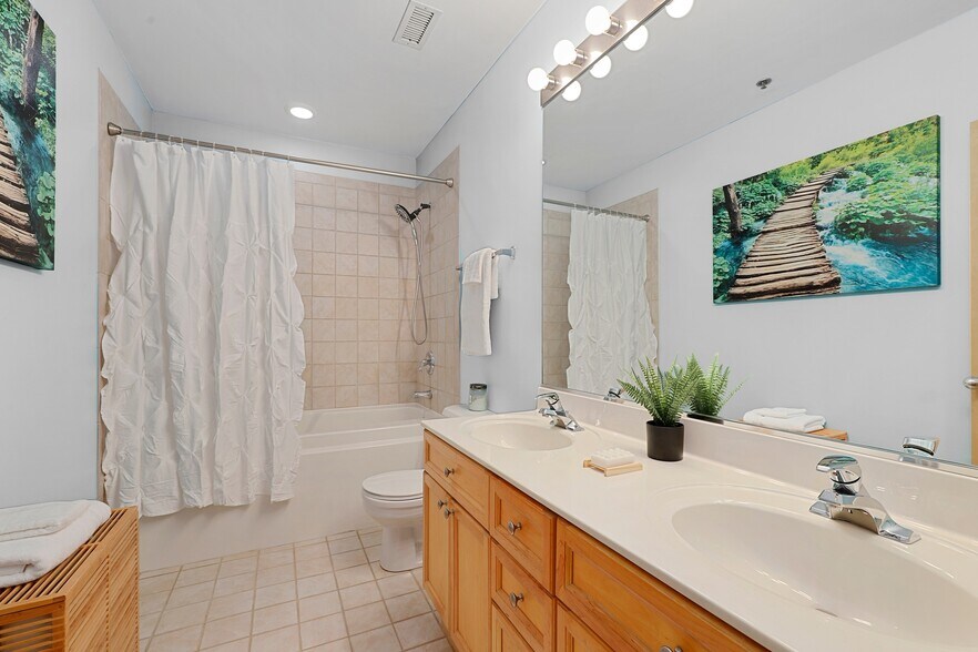 Master bath with double sink vanity & European style shower - 417 S Jefferson St
